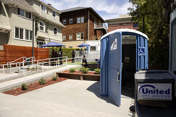 View of the drop-in center from the ADA accessible porta potty bathroom.