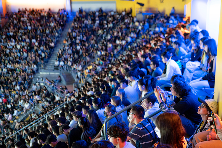 Rows and rows of students in Haas Pavilion take part in fall convocation 2022.