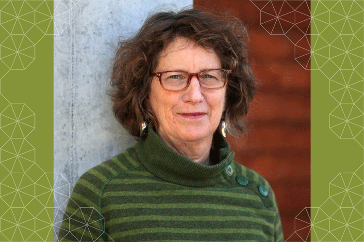 informal portrait of Carol Zabin, with moss-green tesselation at left and right margins