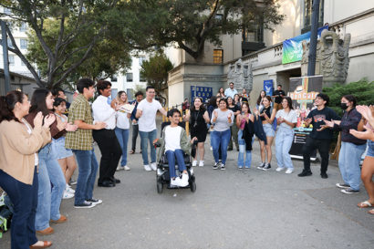 Students dancing in front of the Latinx Student Resource Center.