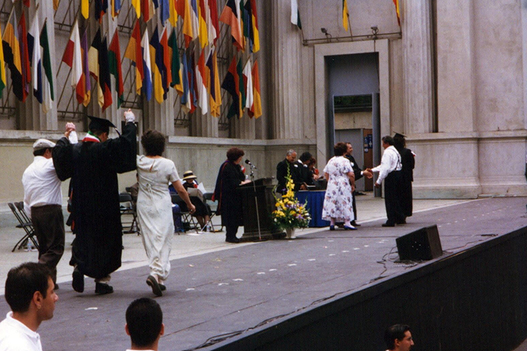 Fabrizio Mejia walking at Latino graduation in 1997