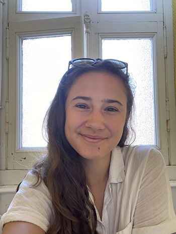 A selfie by Maylis Peyron shows her looking at the camera. She's a sophomore getting two humanities degrees and planning a career in environmental development