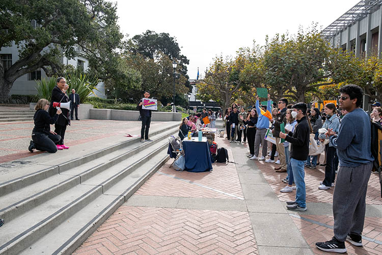 betty yee speaks to a crowd of people on Sproul Plaza