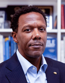 headshot of David C. Wilson, dean of the Goldman School of Public Policy, in his UC Berkeley office