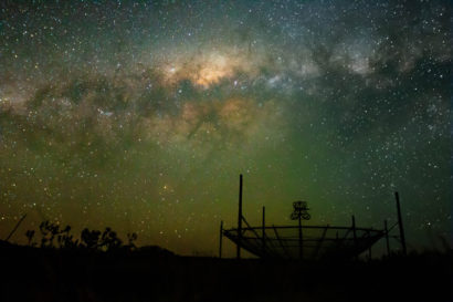 nighttime at telescope, with galaxy of stars overhead