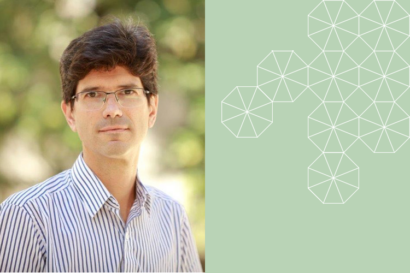 Federico Echenique headshot/ he's wearing a collard shirt and glasses and standing in front of greenery