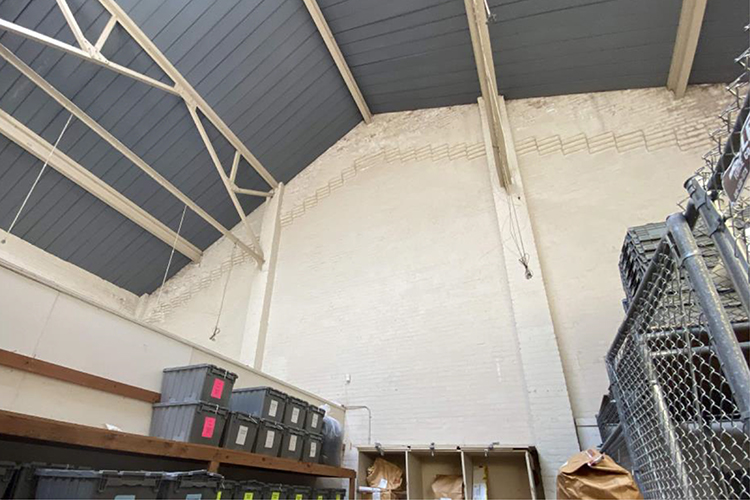 Interior view of the Old Art Gallery's roof trusses at the north end and the large central sky light.