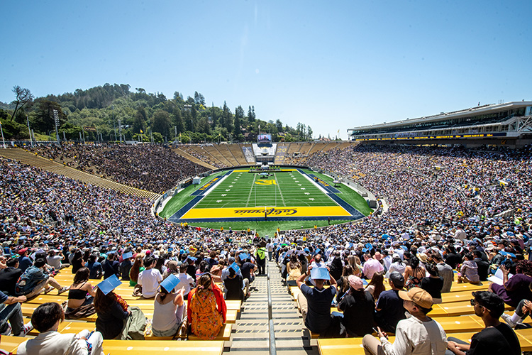 Wide shot of the entire field and audience.