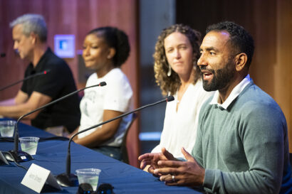 Aaron Streets speaking at a panel