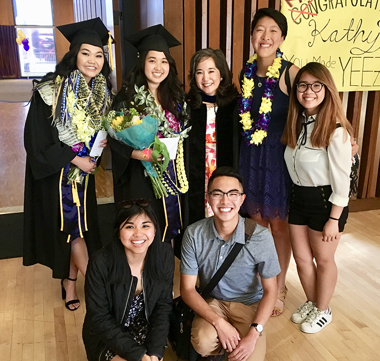 Lisa Tsuchitani with students during graduation