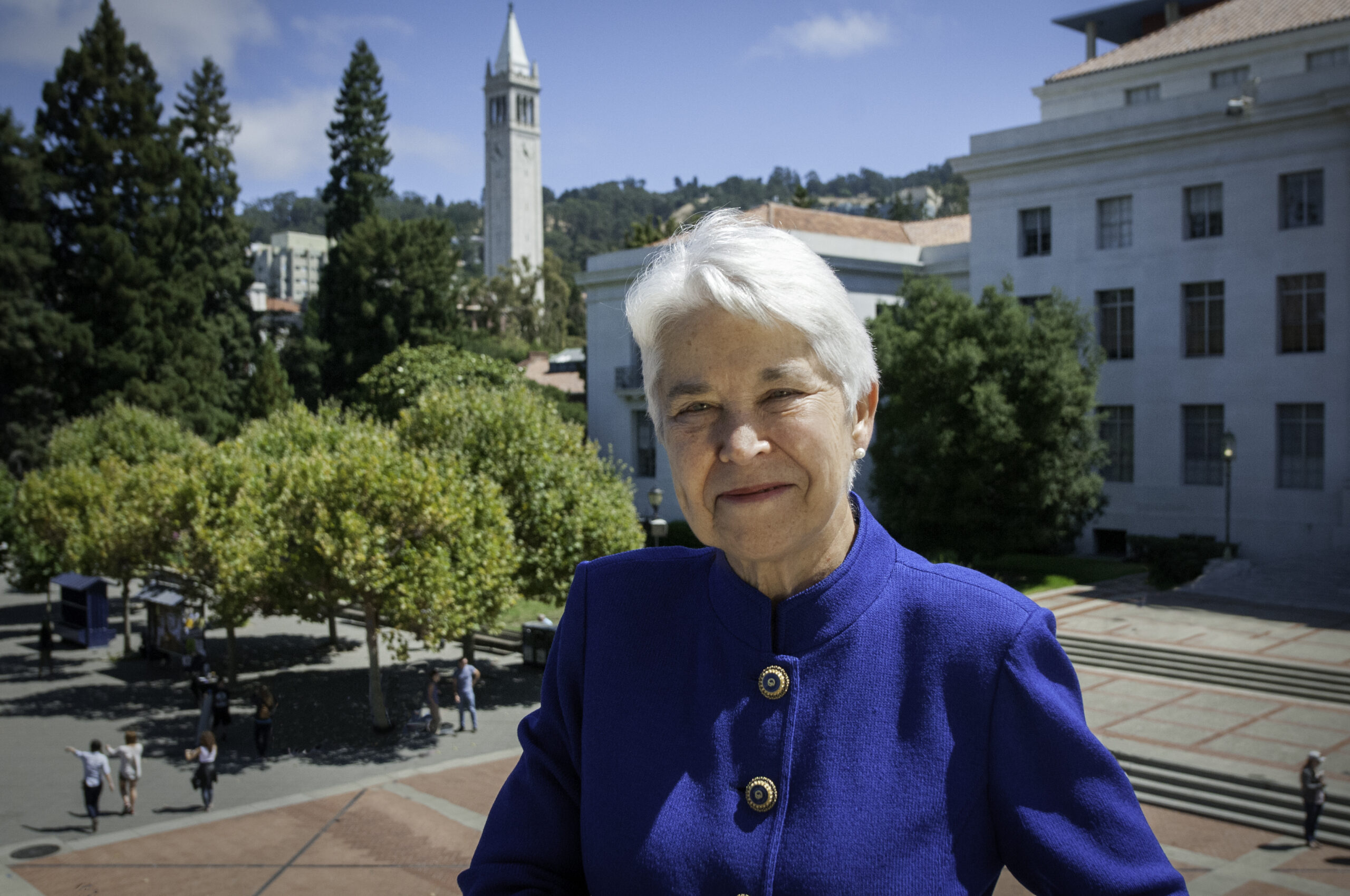 A portrait of Chancellor Carol Christ on a sunny day, with the UC Berkeley campanile in the background.