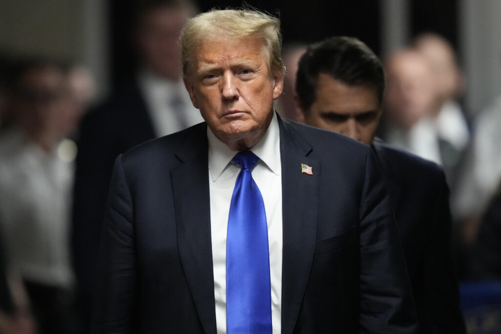 Donald Trump looks toward a camera after a jury found him guilty.