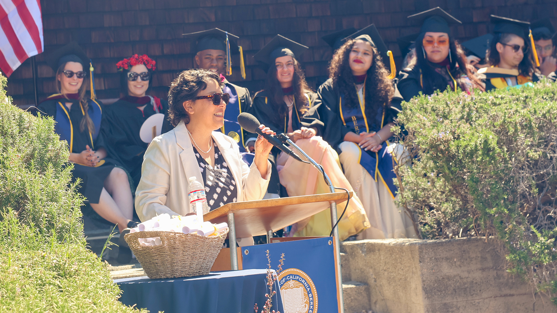 Filmmaker Carrie Lozano gives a speech at a UC Berkeley journalism commencement ceremony