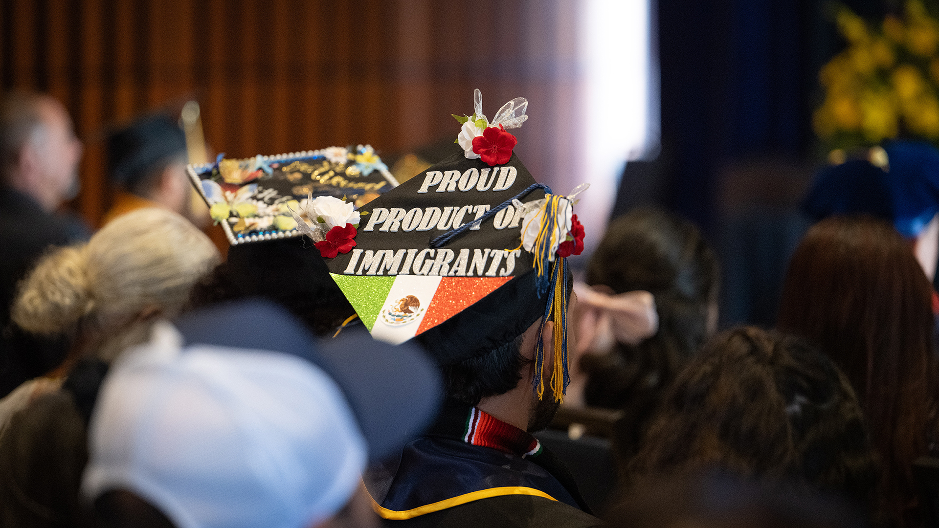 A graduating student's mortar board reads 