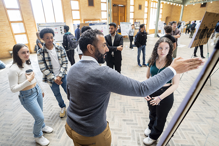 Aaron Streets presenting a project to students