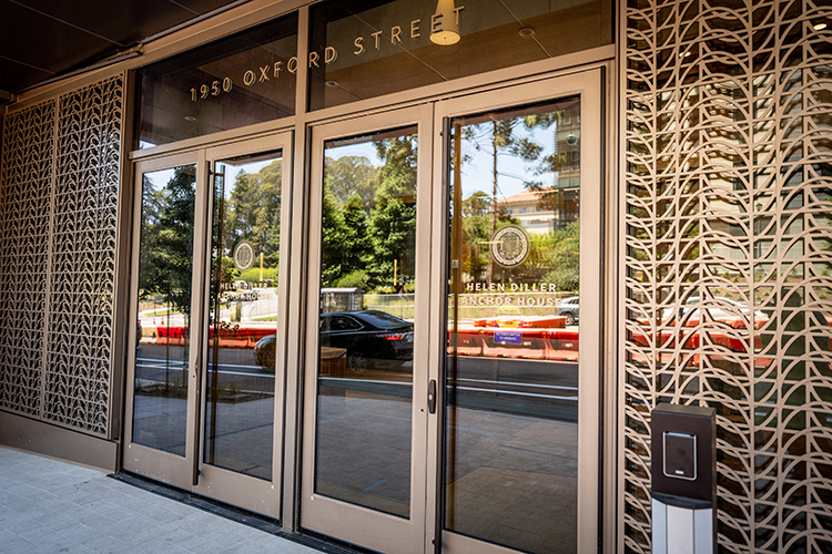 The main entrance to Anchor House is decorated with distinctive, curved metalwork .