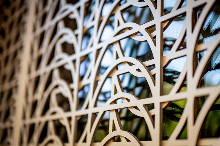 The distinctive curved metal work around the main entrance to Anchor House on Oxford Street pays homage to the arched facade of the former University Garage that once occupied the site.