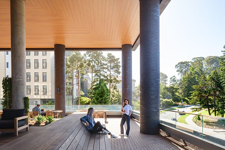 An outdoor terrace on the second floor of Anchor House overlooks the campus's West Crescene lawn and offers beautiful views and many places for students to sit quietly or with friends and enjoy fresh air and sunlight.