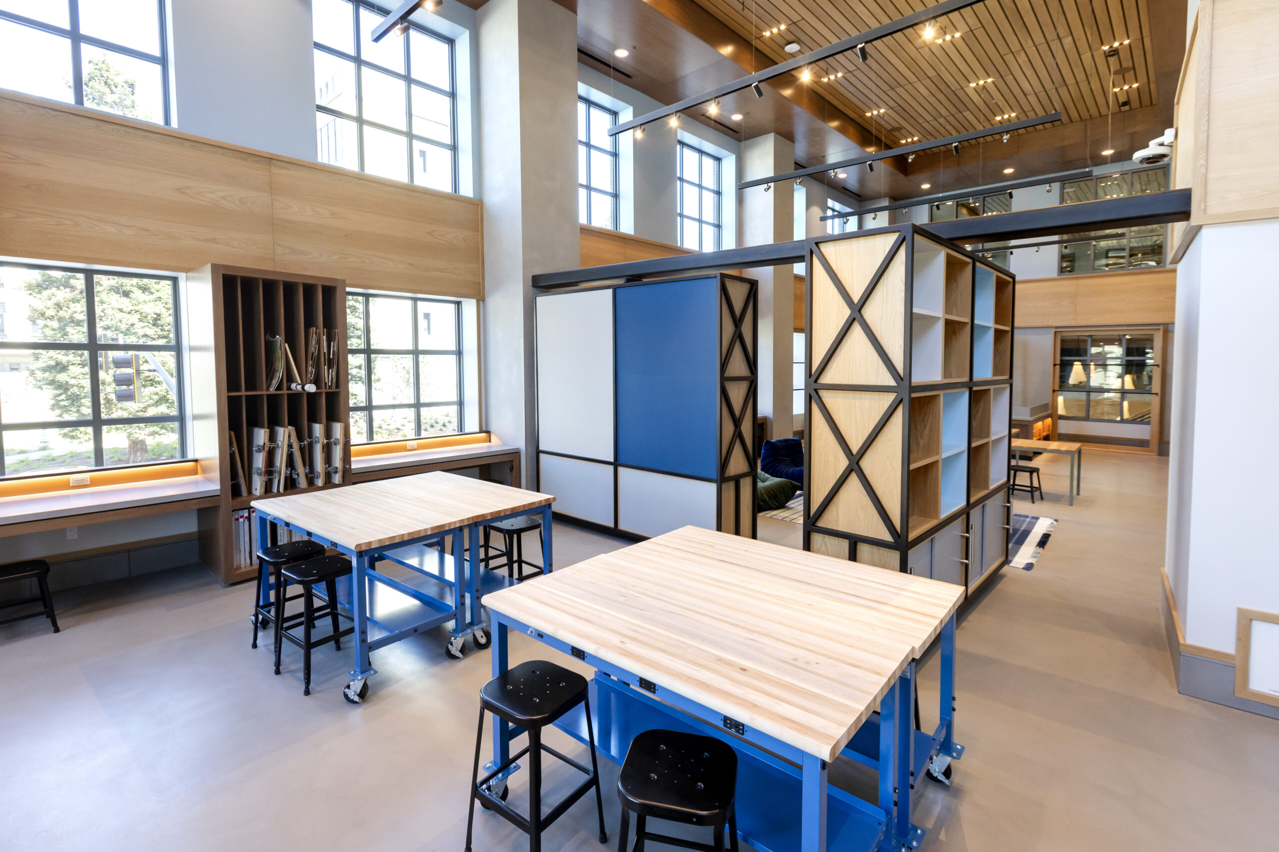 The new Berkeley Art Studio satellite facility in Anchor House, the new residence for transfer students, is modern and filled with moveable walls, storage bins and tables. It has a large wall of windows, tall ceilings and wooden floors.