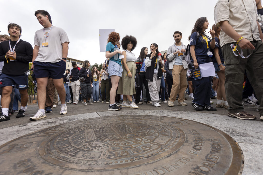 New students attending Golden Bear Orientation avoid stepping on a large metal campus seal affixed to the ground near Memorial Glade. Campus superstition says that stepping on one prevents a student from achieving a 4.0 GPA.