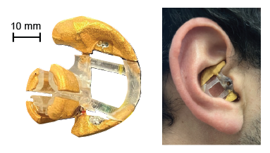 The right side shows a gold colored schematic of an earbud, and the left side shows an ear with the earbud inserted.