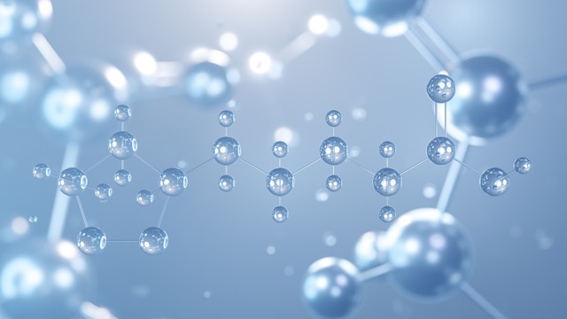 Bubbles are suspended in front of a light blue background.