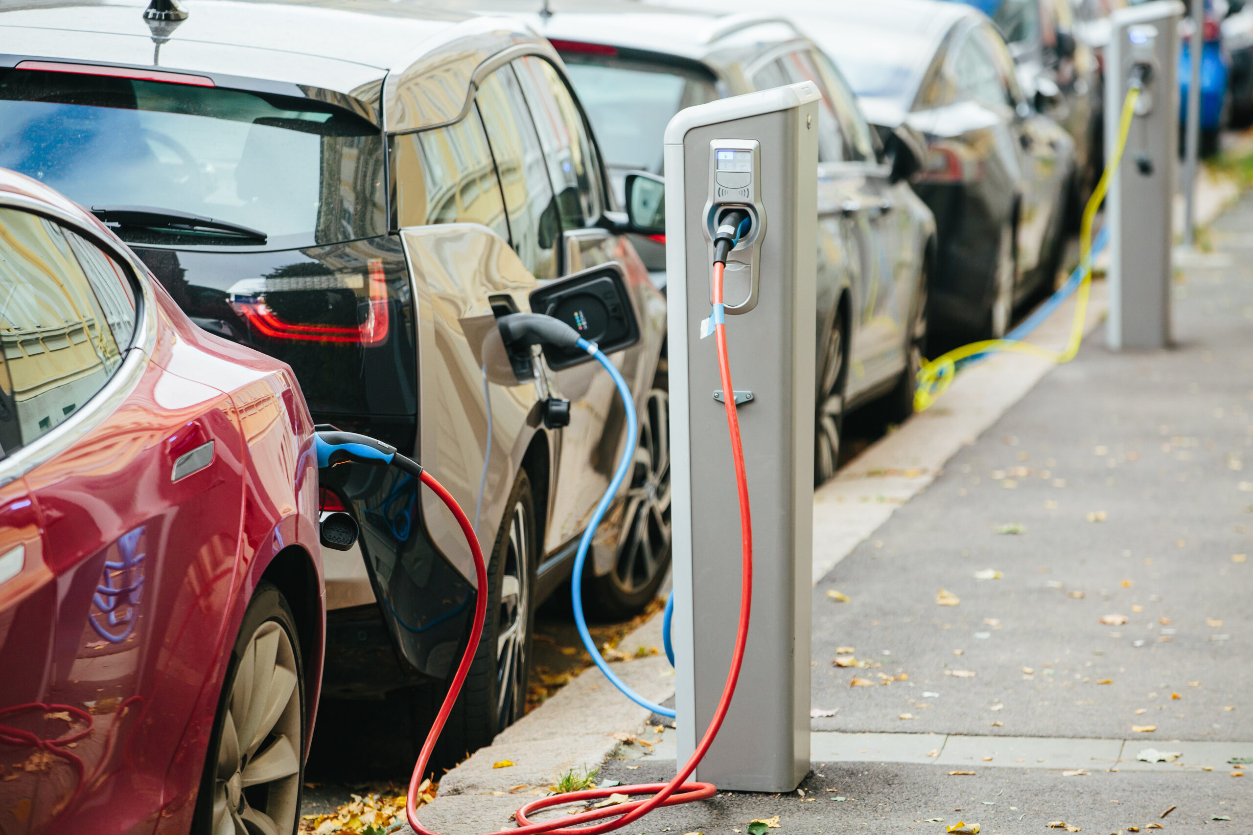 An electric vehicle at a charging station.