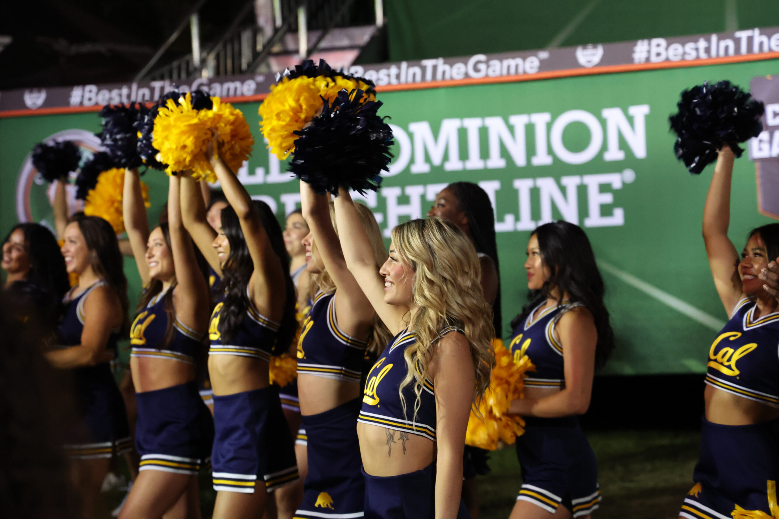 Cal cheerleaders show their school spirit for the show.