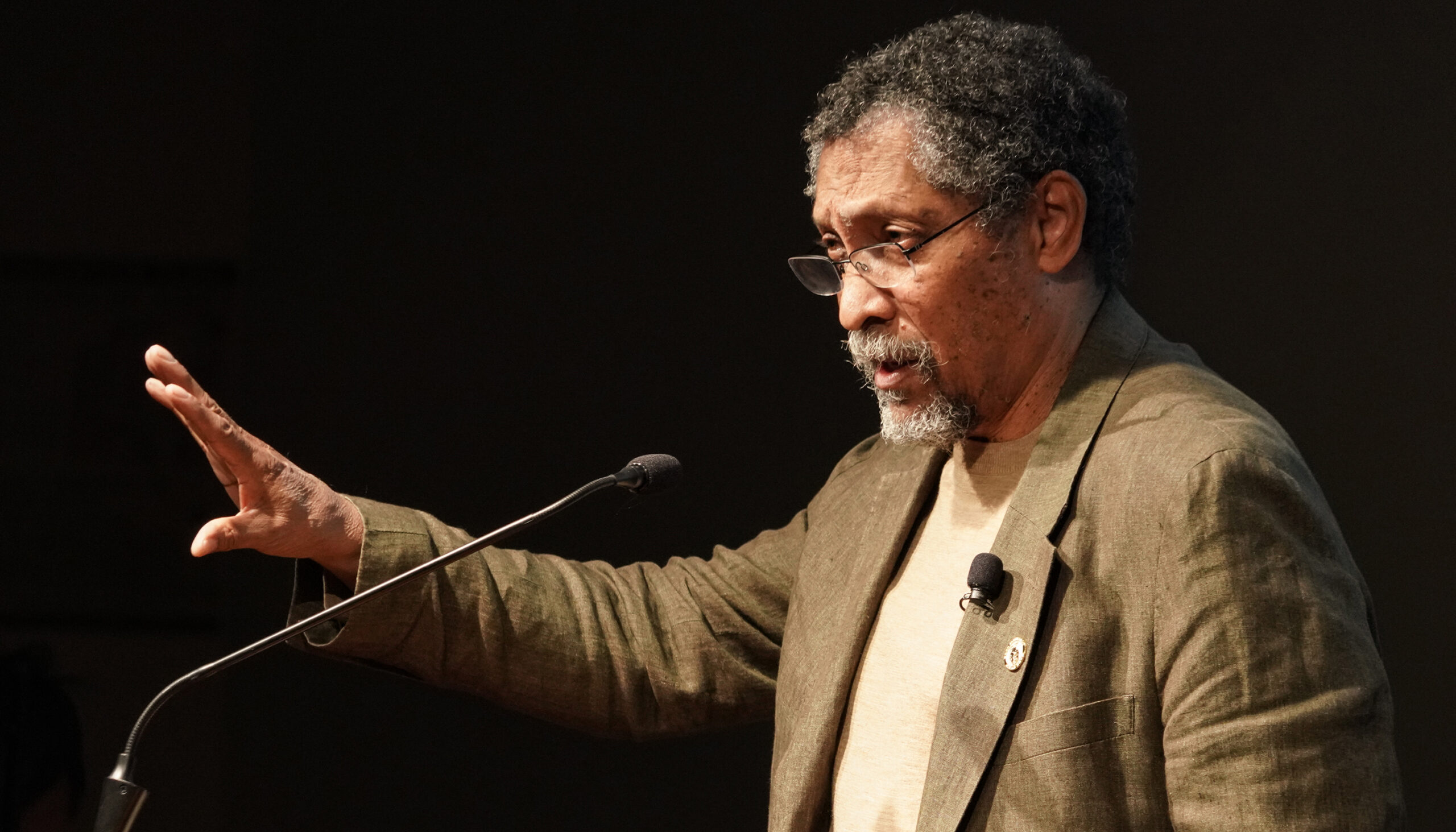 Percival Everett speaks at a podium at a UC Berkeley event