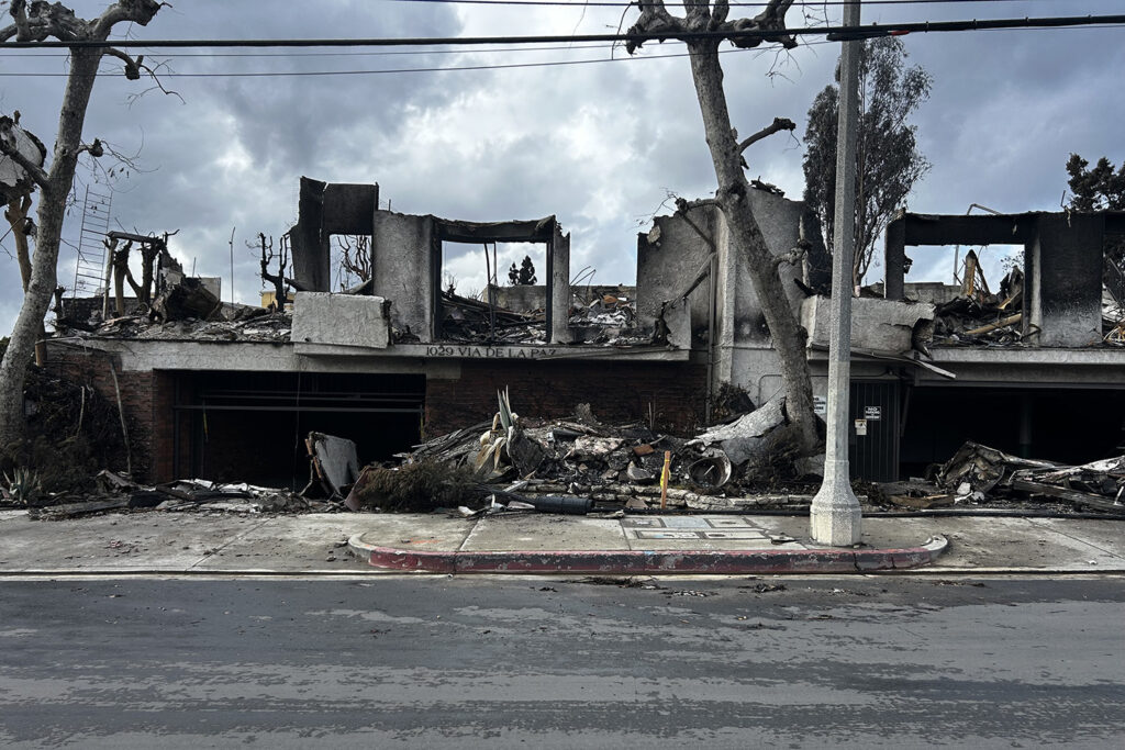 A destroyed condo building in Pacific Palisades as seen from the front of the building, where student Erin Wall lived with her father and his partner.