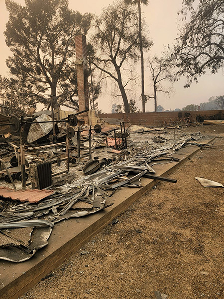 Rubble remains of the home of Professor Chris Schell's maternal grandmother's home after the Eaton Fire