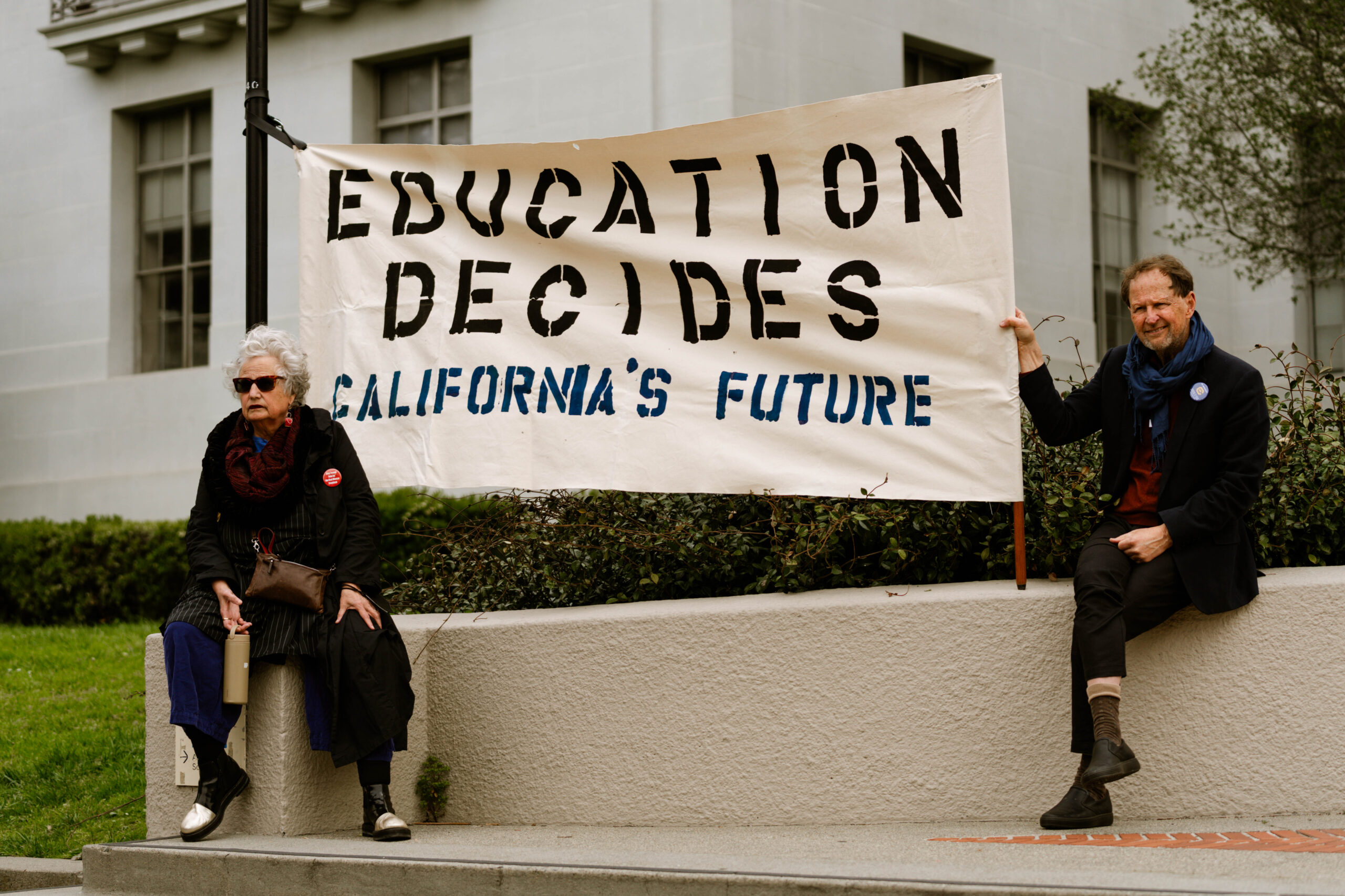 Protestors gather on Sproul Plaza for a rally against Trump administration attacks on higher education.