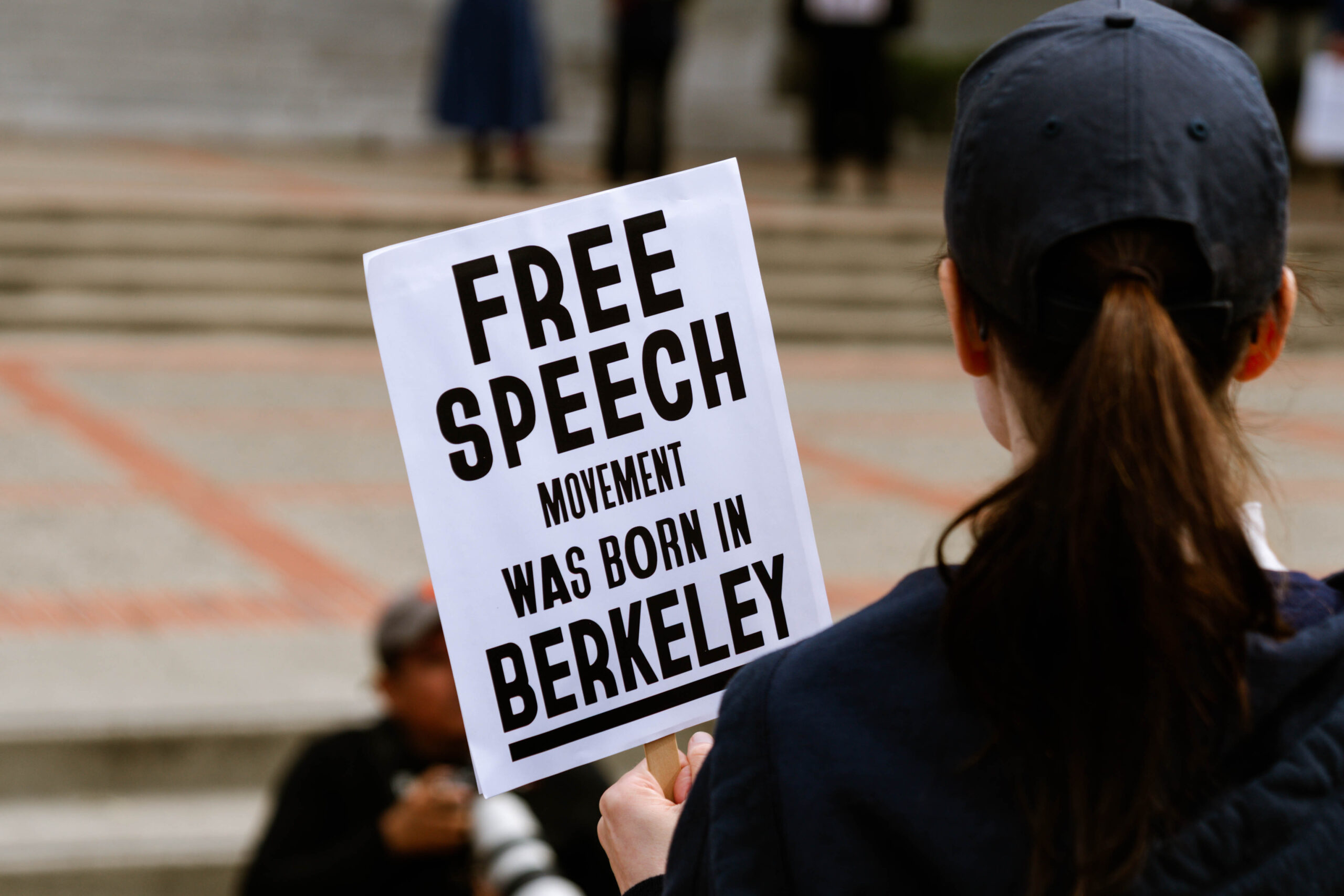 Protestors gather on Sproul Plaza for a rally against Trump administration attacks on higher education.