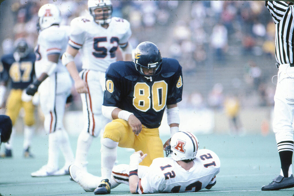 Ron Rivera pictured on field after a sack during his career as a linebacker for the California Golden Bears.