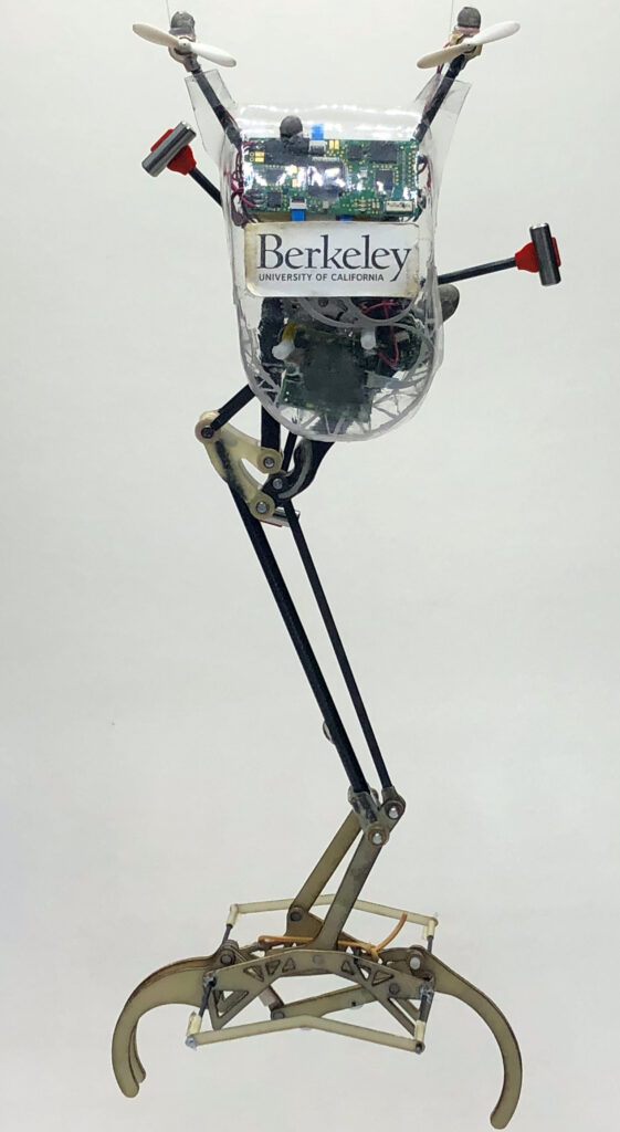 a skeletal robot with large grippers on its foot, bearing a label reading "Berkeley, University of California."