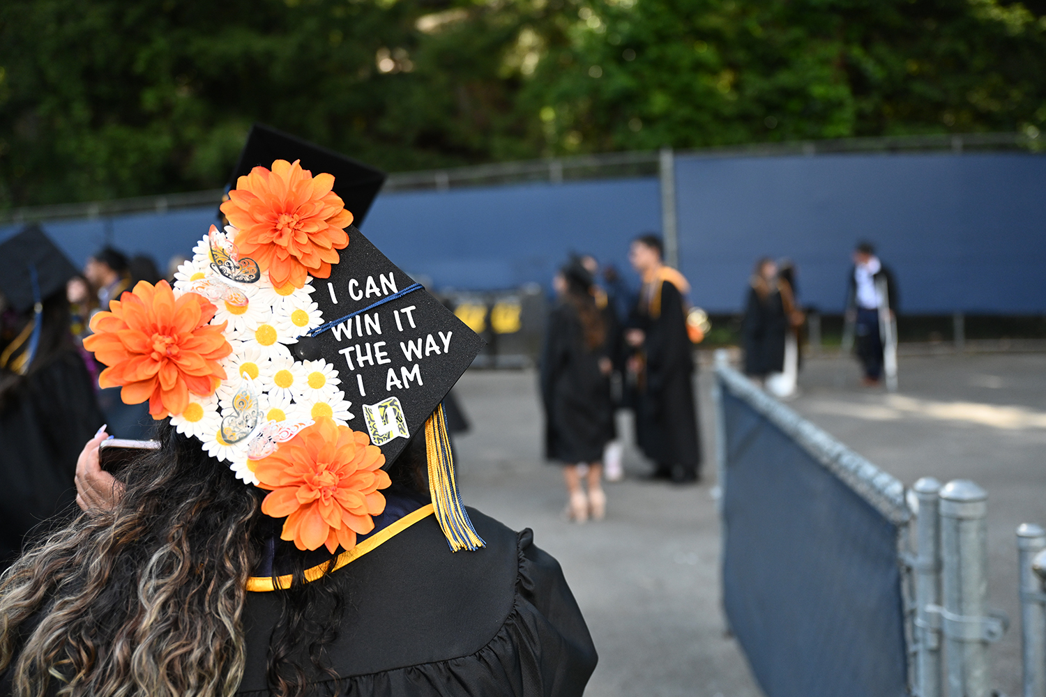 A mortarboard on a 2025 graduate says 