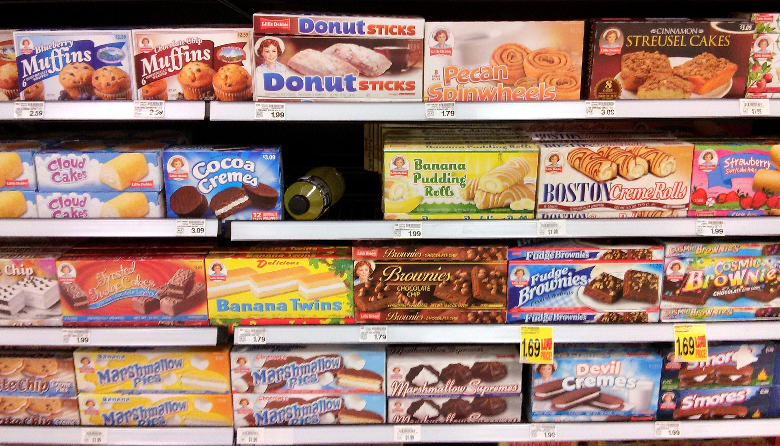 rows of packaged junk food in a grocery store