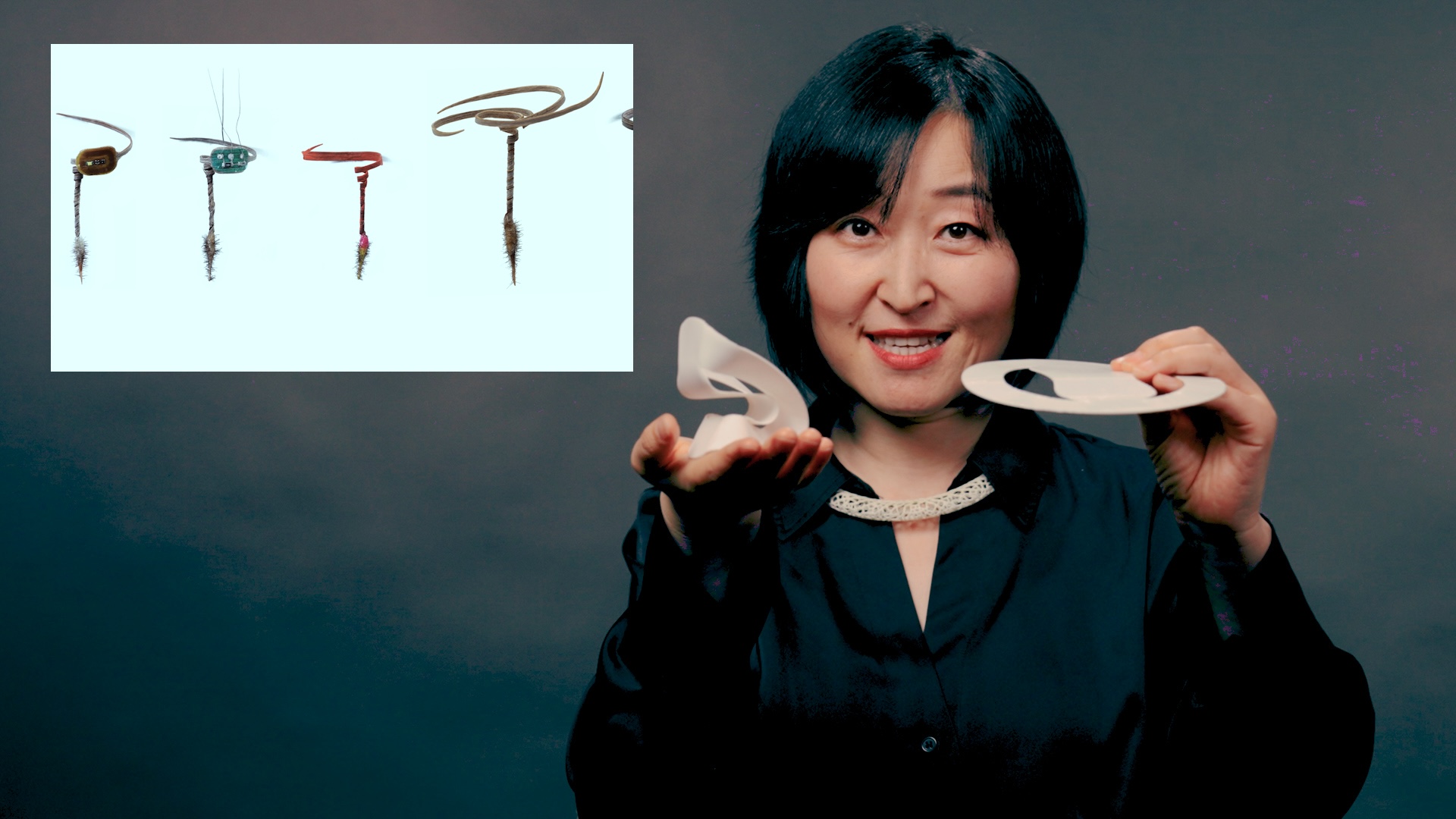 Professor Lining Yao with models created in the Morphing Matter Lab.