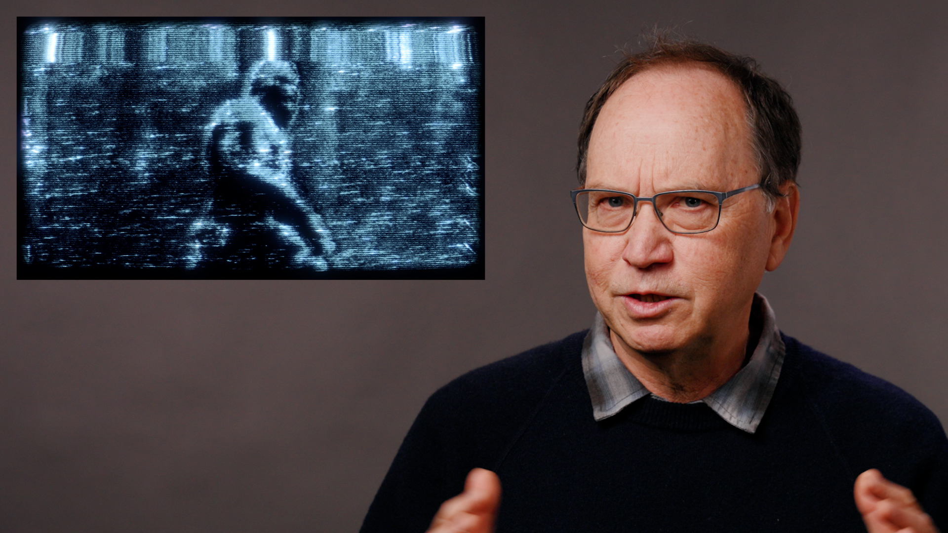 a man on a gray background with an inset grainy image of a bigfoot.