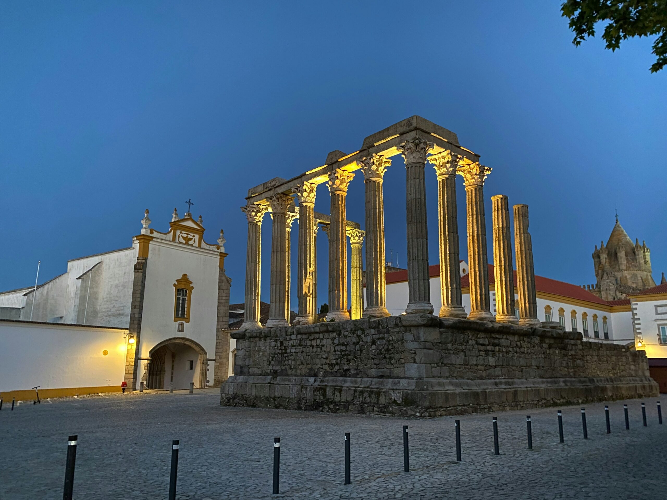 Roman columns illuminated at night