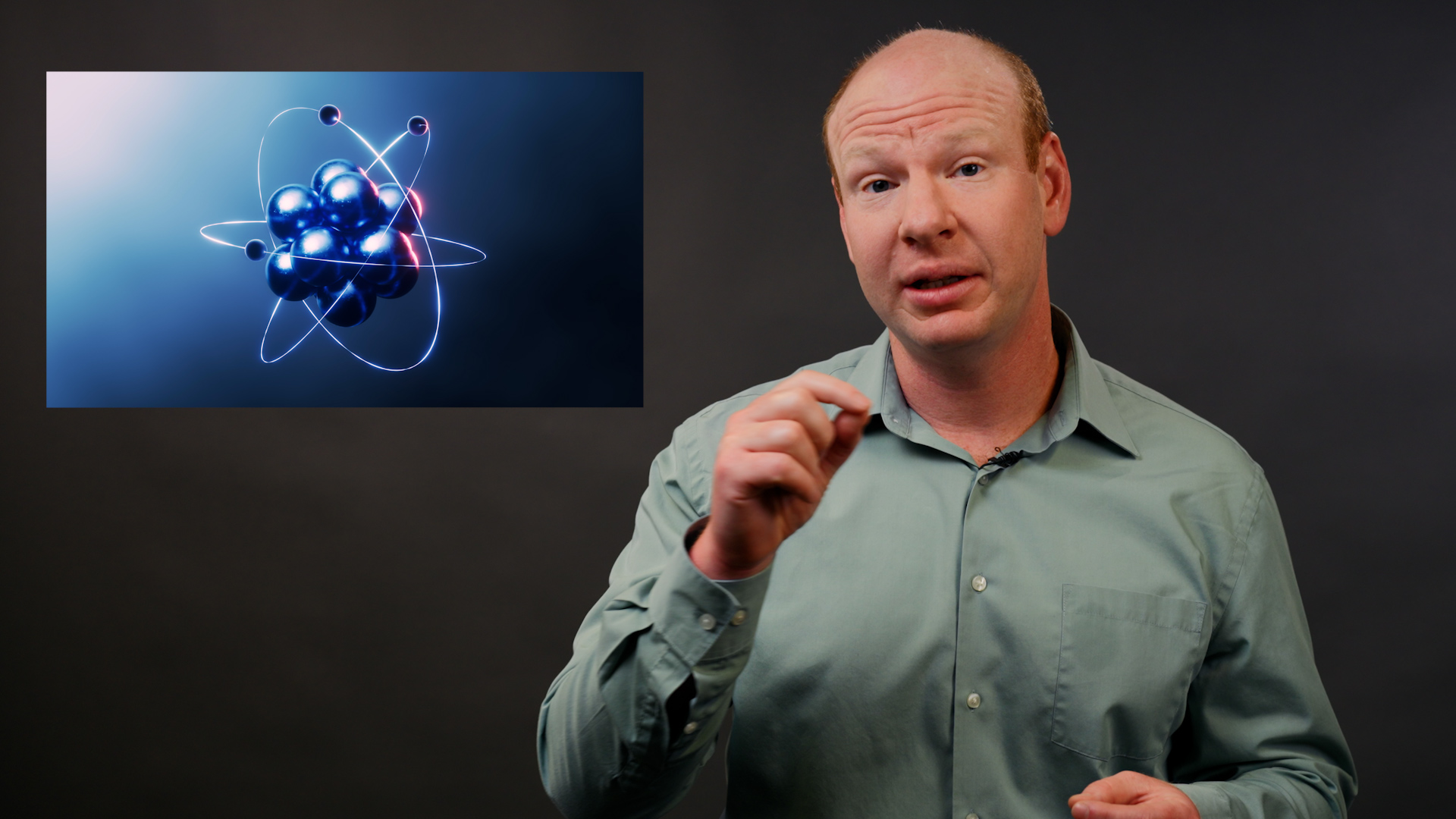 A man on a gray background with an inset image of a scientific rendering of a molecule