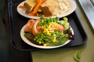 Plates of food on tray.