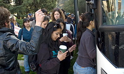 Student boarding a bus.