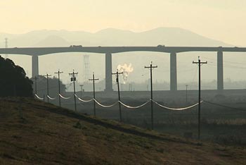 Power lines run under the Antioch Bridge/Highway 160