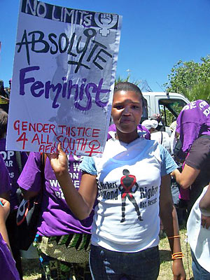 girl holding sign about feminism