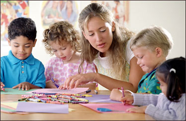 Teacher with children