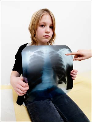 Child holding xray