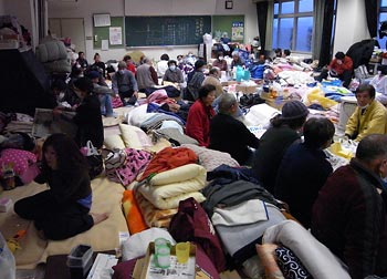 Residents of an evacuation shelter