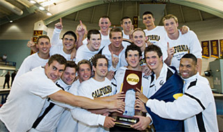 Men's swim team with trophy