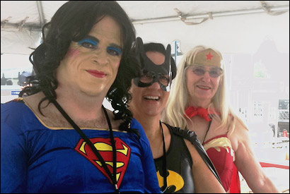 Rest stop workers in superhero drag.